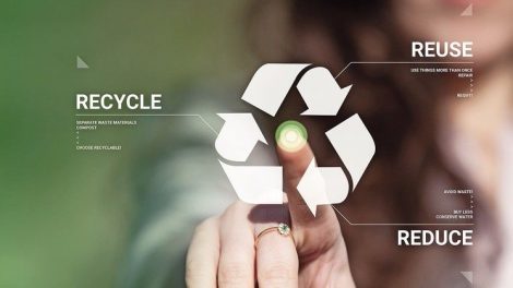 Businesswoman_touching_recycling_symbol_on_virtual_touch_screen._Environmental_concept_recycle_-_reduce_-_reuse.