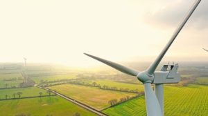 Aerial_photo_of_wind_turbines_at_sunset_in_Sainte_Pazanne,_France
