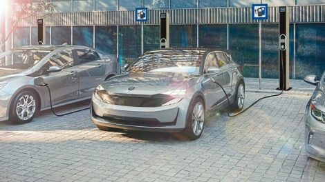 electric_suv_of_the_future_charging_electricity_with_public_charger