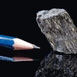 Rough_piece_of_carbon_rock_mineral_in_the_form_of_graphite,_an_allotrope_of_carbon,_known_for_its_use_in_pencils_