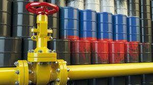Oil_pipe_line_valve_in_front_of_the_russian_flag_on_the_oil_barrels._Iranian_gas_and_oil_fuel_energy_concept._3d_illustration