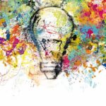 Concept_of_a_new_creative_idea_with_drawn_and_colored_bulb_with_bright_colors